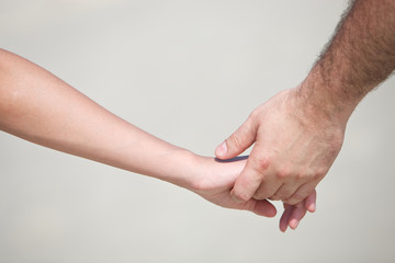 couple holding hands