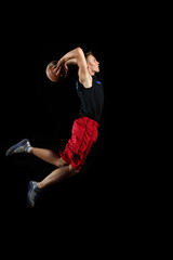 Basketball player with a ball