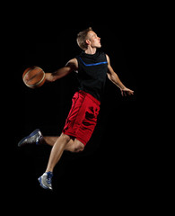 Basketball player with a ball