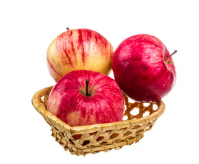fresh red apples in the dish isolated on white background