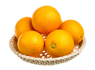 heap of oranges in the dish on white background