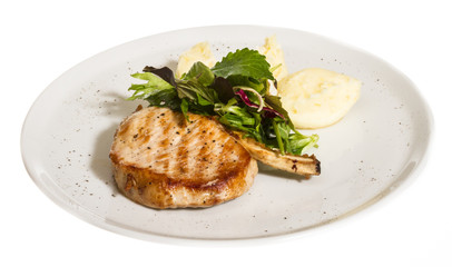 Grilled pork with salad and potato
