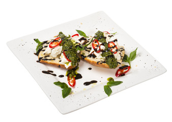 Fresh toast sandwiches with cheese and basilic and pesto.