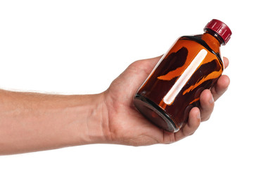 Hand with small bottle