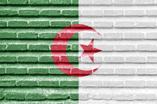 Argelia flag on an old brick wall