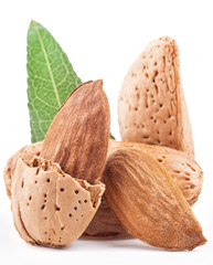 Almond nuts with leaves. Isolated on a white