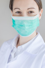 portrait of a female surgeon, with face mask