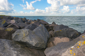 Dike along a lake in autumn