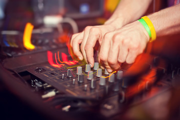 Dj mixing in night club