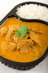 Takeaway curry - Chicken curry and rice in a plastic container