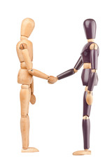 Wooden dummies shaking hands
