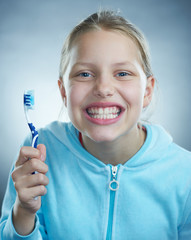 Little girl with toothbrush