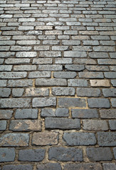Old London cobblestone street close up.