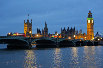 Westminster Bridge and the Houses of Parliament at dusk.
