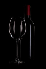 Wine bottle and glass outline on black