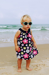 Portrait of cute 1,5 years old baby with fashion vintage sunglas