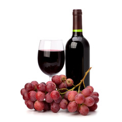 Fototapeta premium Full red wine glass goblet, bottle and grapes