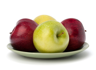Apples pile on plate