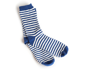 Two blue and white striped socks on white background - 45529246