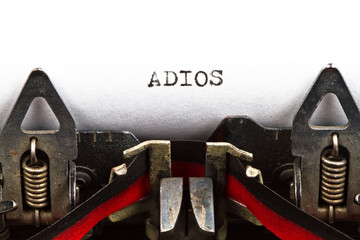 typewriter with text adios