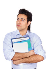 A young man with books, isolated on white background