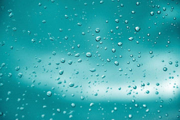 Water drops on blue surface