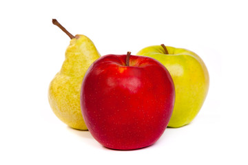 A pear and a red apple and a green apple isolated on white