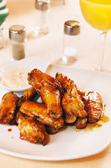 Chicken wings in wine sauce