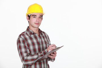 Man with helmet and briefcase in hand