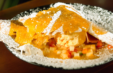 Vanilla ice cream with fruit salad