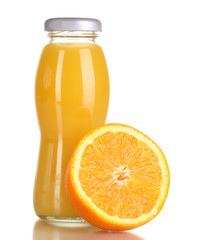 Delicious orange juice in a bottle and orange next to it
