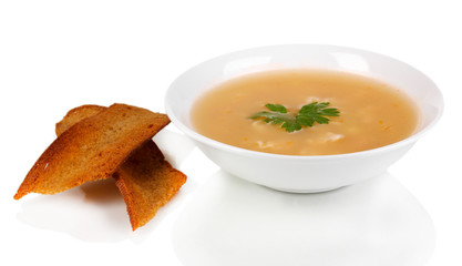 Fragrant soup with garlic croutons isolated on white