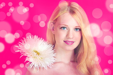 Obraz na płótnie Canvas pretty girl with flower against glitter background
