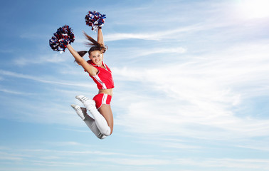 Young female cheerleader