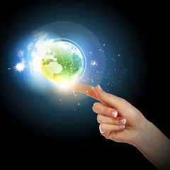 hand touching the earth