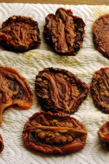 Obraz premium Dried tomatoes Tomates secos Pomodori secchi