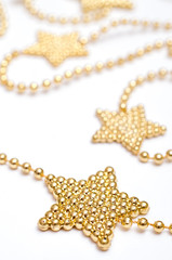 Weihnachtsstern aus goldenen Perlen