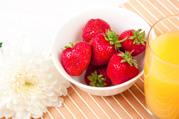 Breakfast with berries,orange juice and croissant