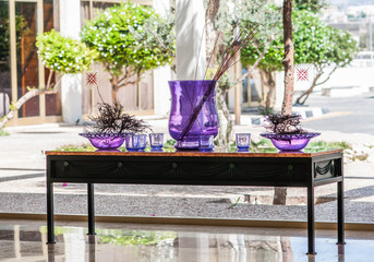 table with purple vases