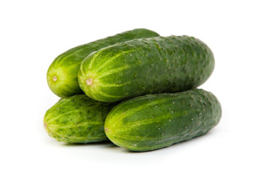 Five Fresh Cucumbers isolated on white