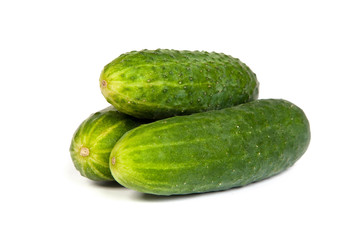 Five Fresh Cucumbers isolated on white