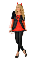 Beautiful blonde woman in carnival costume of devil.