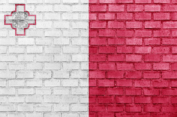 Malta flag on a brick wall