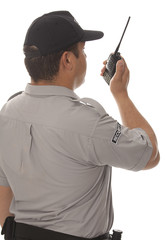 Security guard hand holding cb walkie-talkie radio 