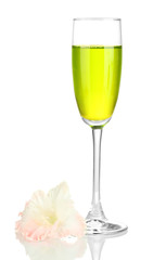 glass with cocktail and gladiolus bud isolated on white