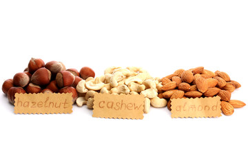 assortment of tasty nuts, isolated on white