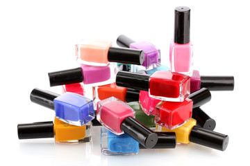 Group of bright nail polishes isolated on white