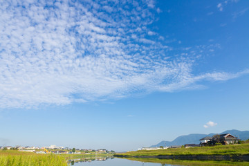 Autumn sky and the riverside