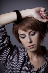 Fototapeta premium Style girl in shirt at studio.