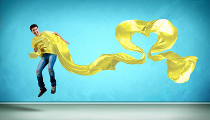 Young man Dancing With Fabric